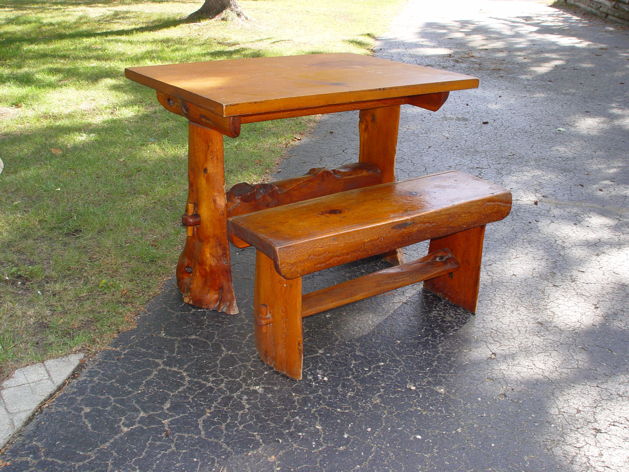 Adirondack styled breakfast
table & bench, 1938 Signed
by Maker
