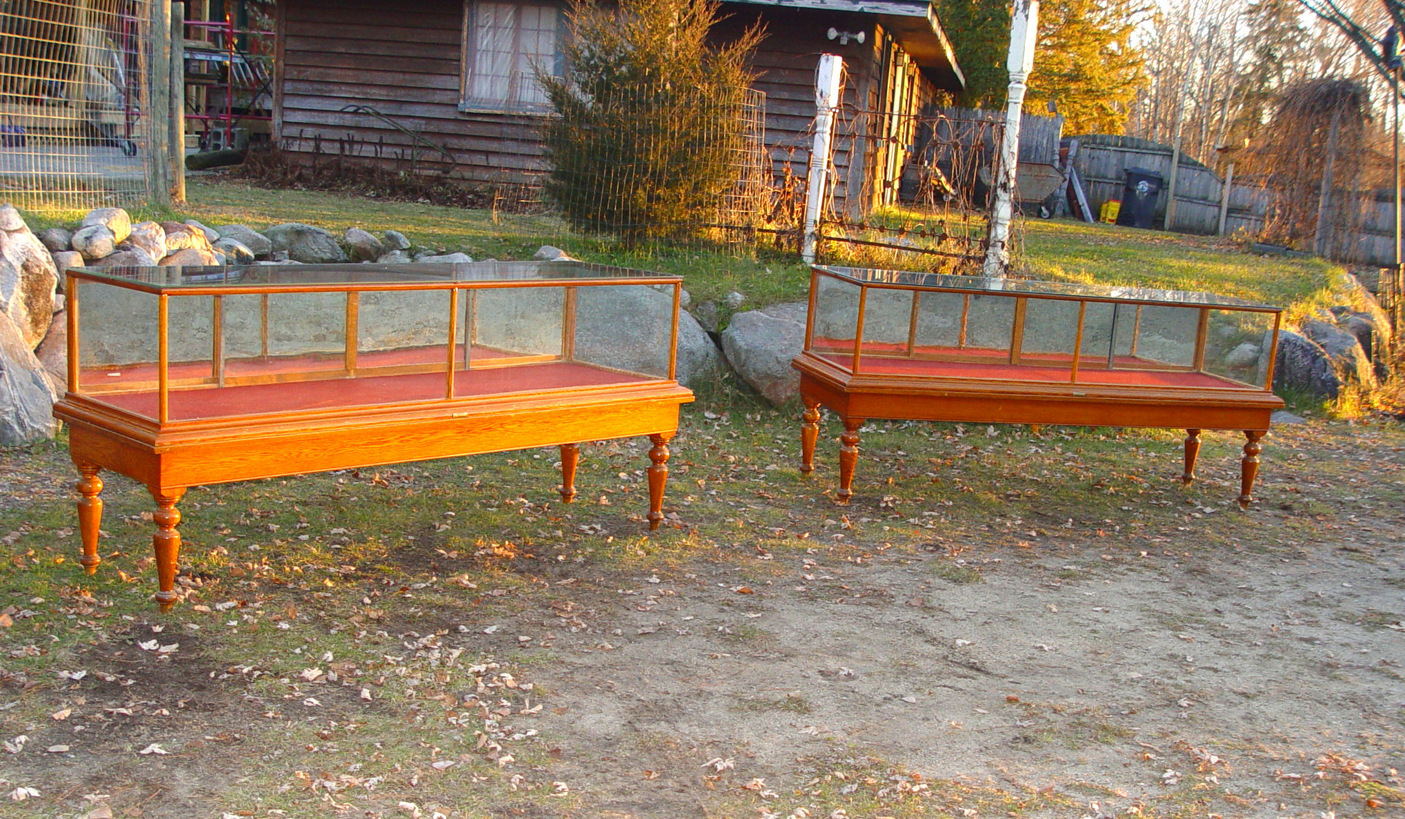 Mercantile turned legged
oak display showcase pair