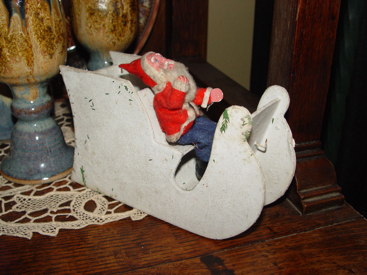 Antique Stovepipe Santa in
White Mica Sleigh Candy
Container
