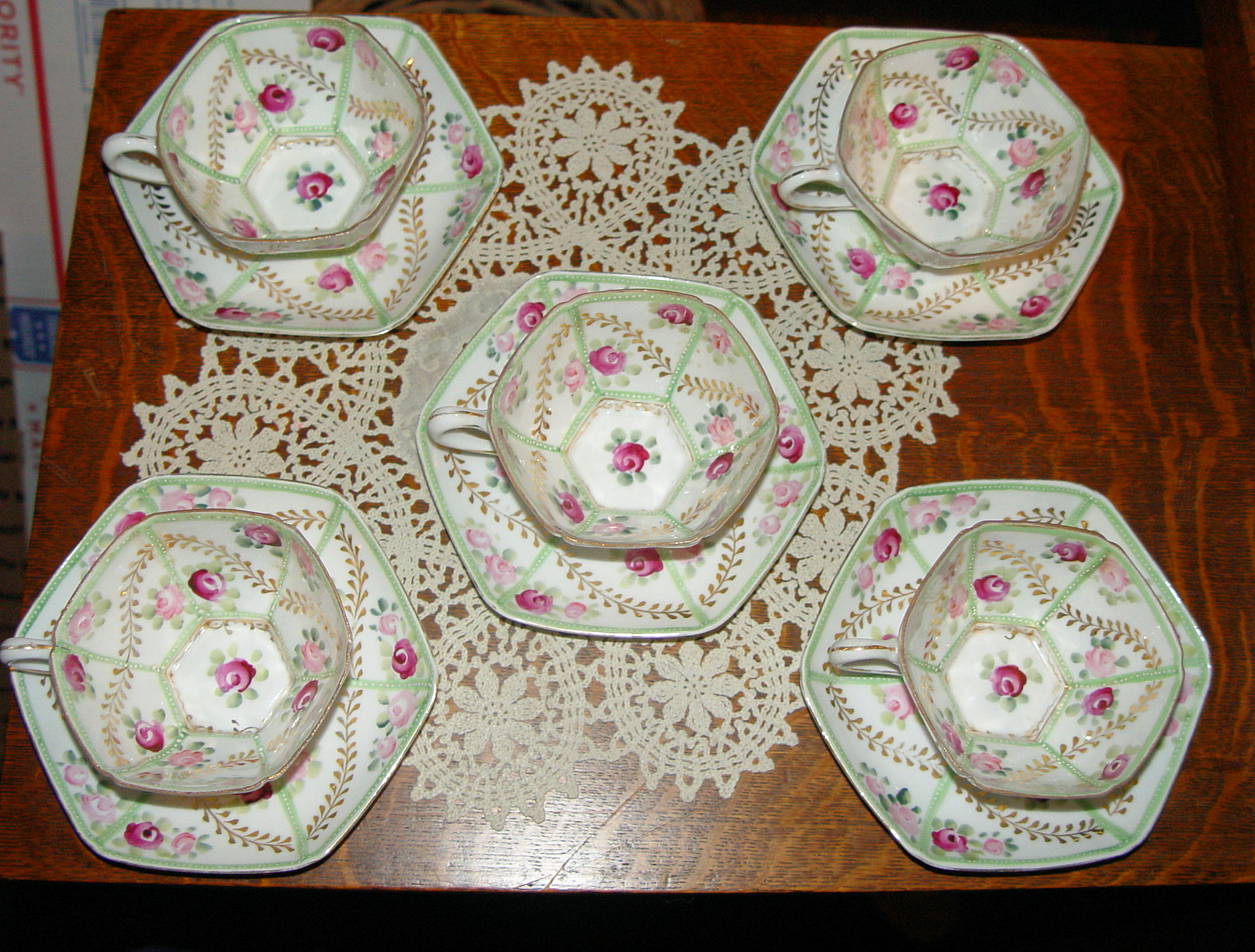 Six Octagon Cup &
                                        Saucers: Burgundy Rose, Green,
                                        & Gold Raised Texture