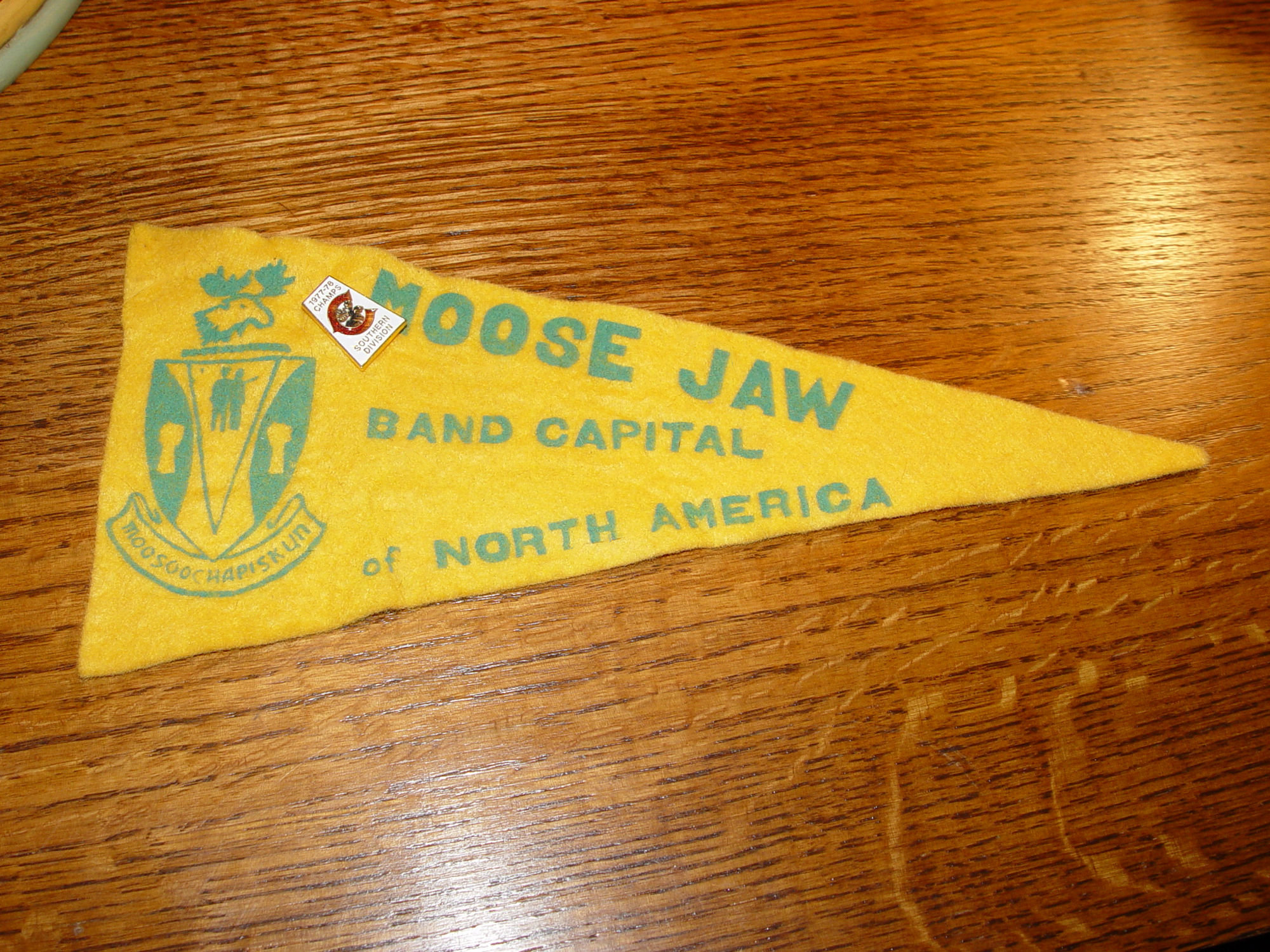 Moose Jaw Saskatchewan Band
                                        Capital of North America;
                                        'Moosoochapiskun' Pennant &
                                        Pin 1977-78