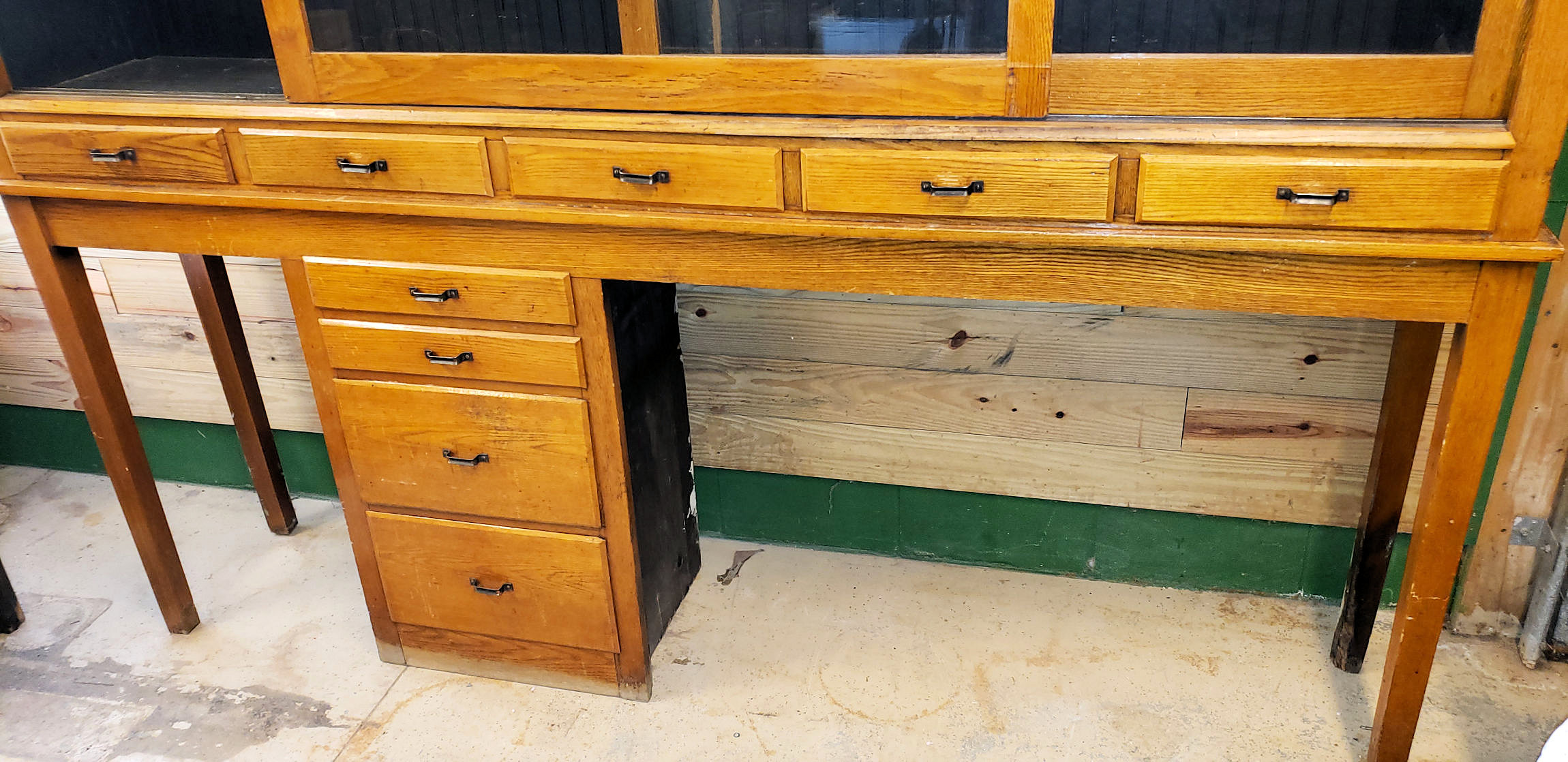 Early 20th c. Oak Display Store Cabinet with
Multi‑Drawer Base
