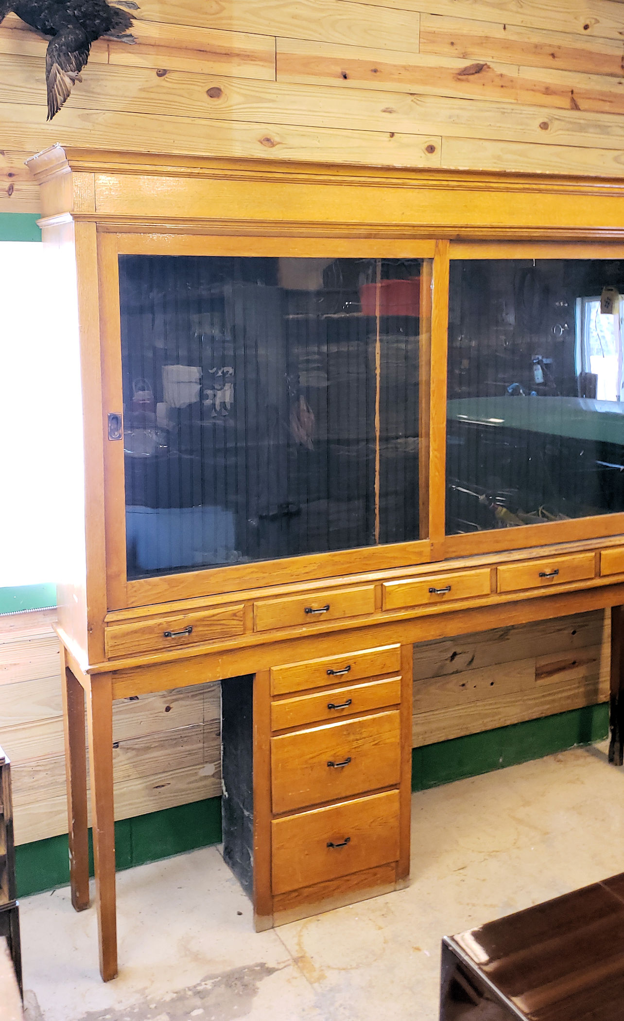 Early 20th c. Oak Display Store Cabinet with
Multi‑Drawer Base