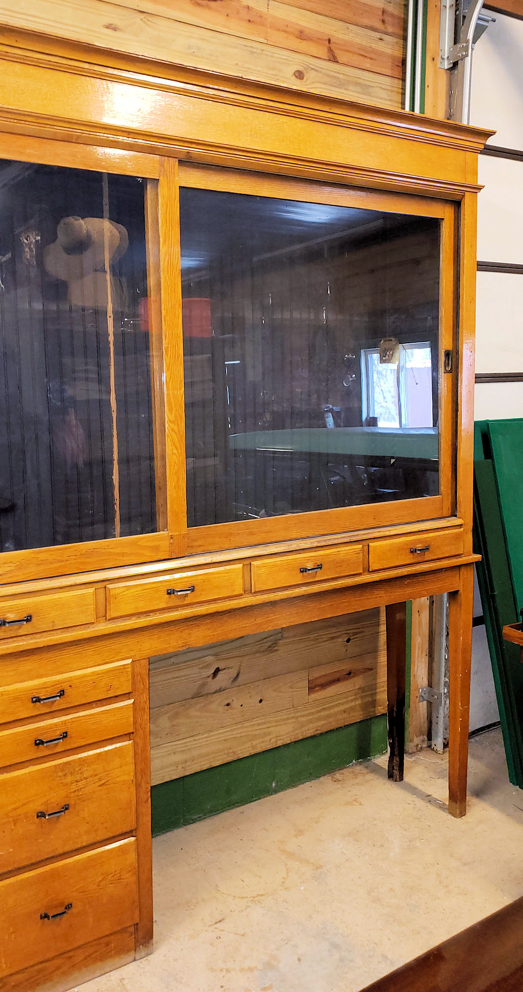 Early 20th c. Oak Display Store Cabinet with
Multi‑Drawer Base
