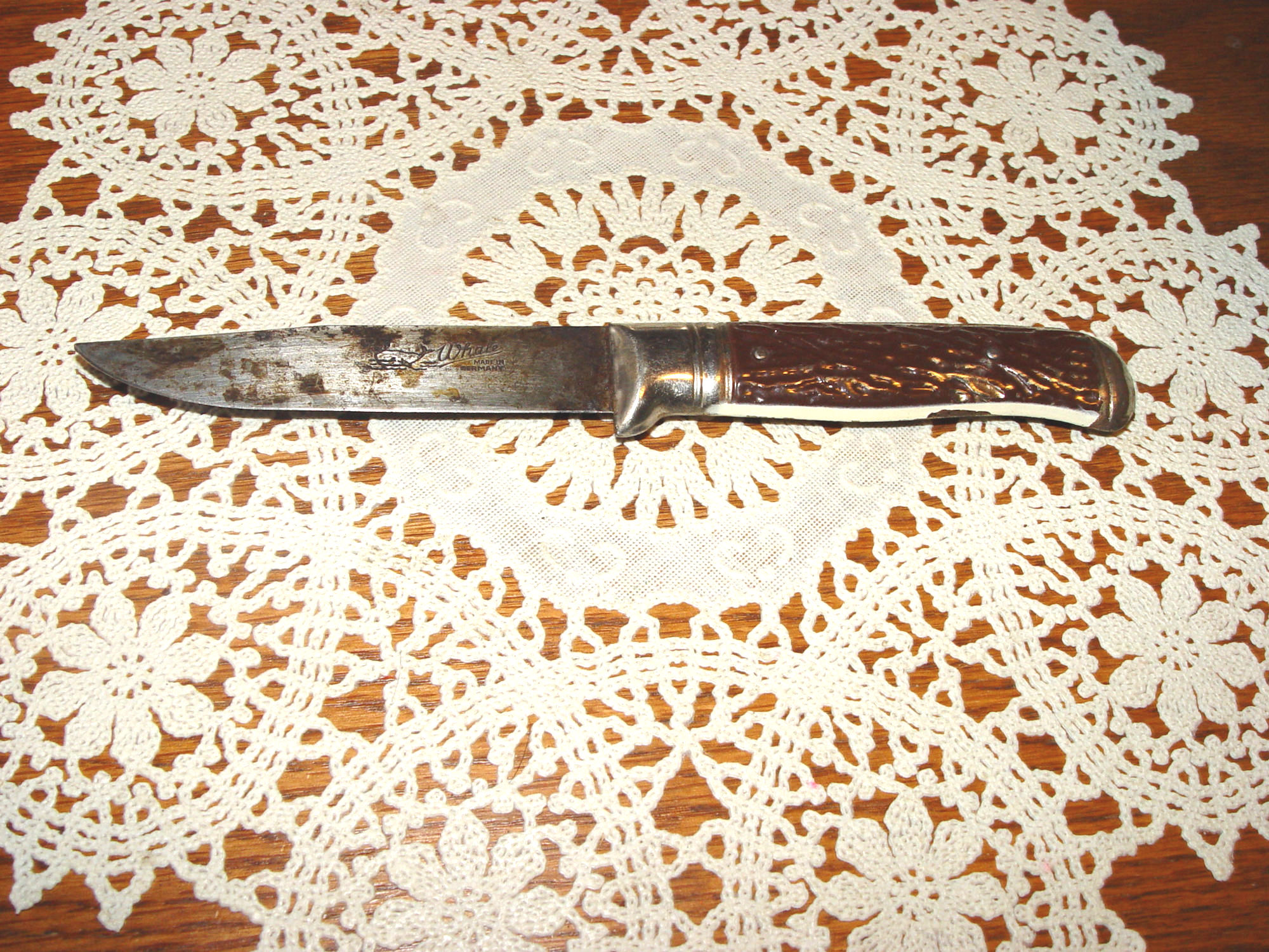 Vintage
                        WHALE knife, tin painted handle - Made in
                        Germany