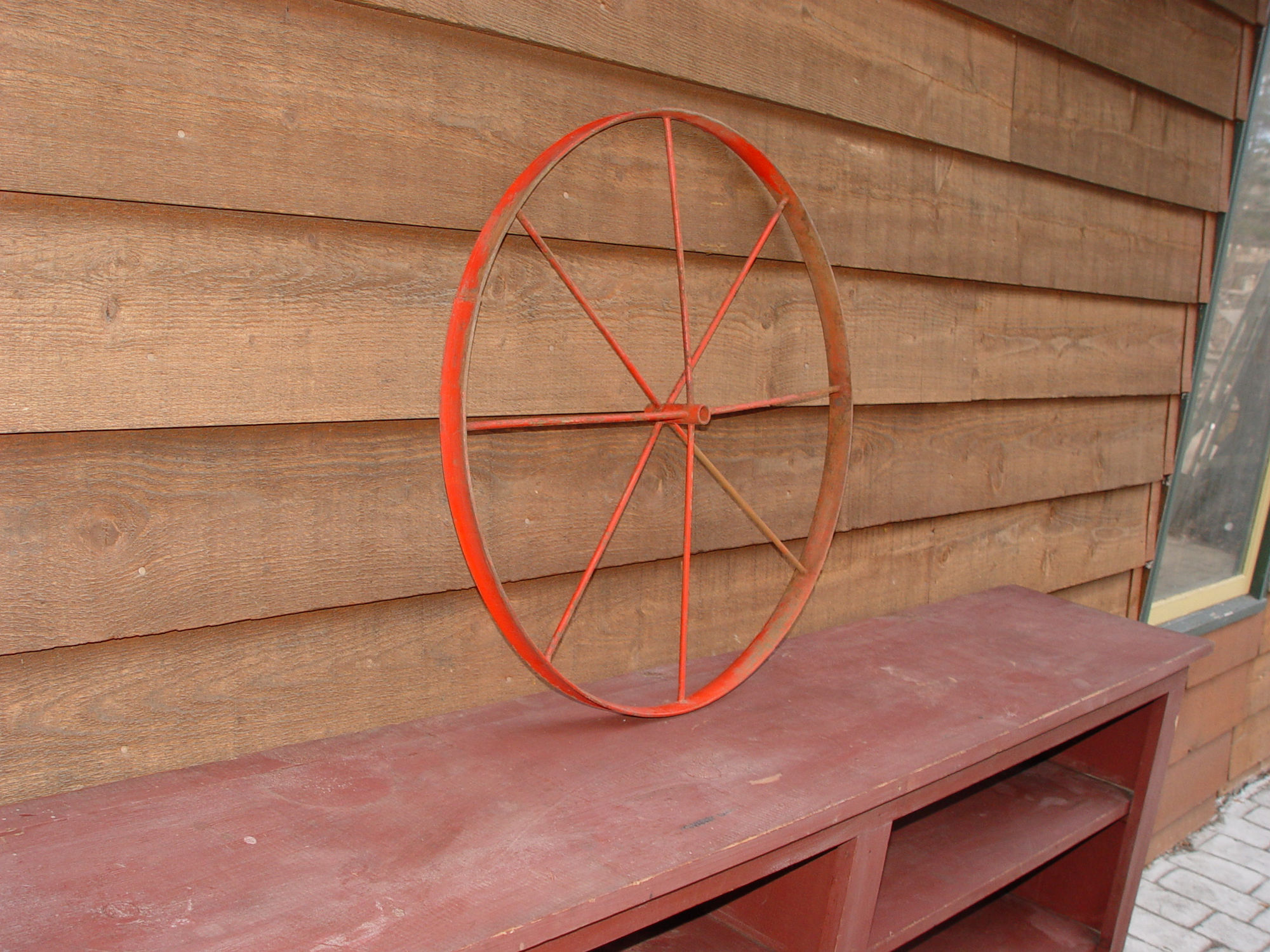 Red antique garden hand
                                        plow NOS steel spoked wheel