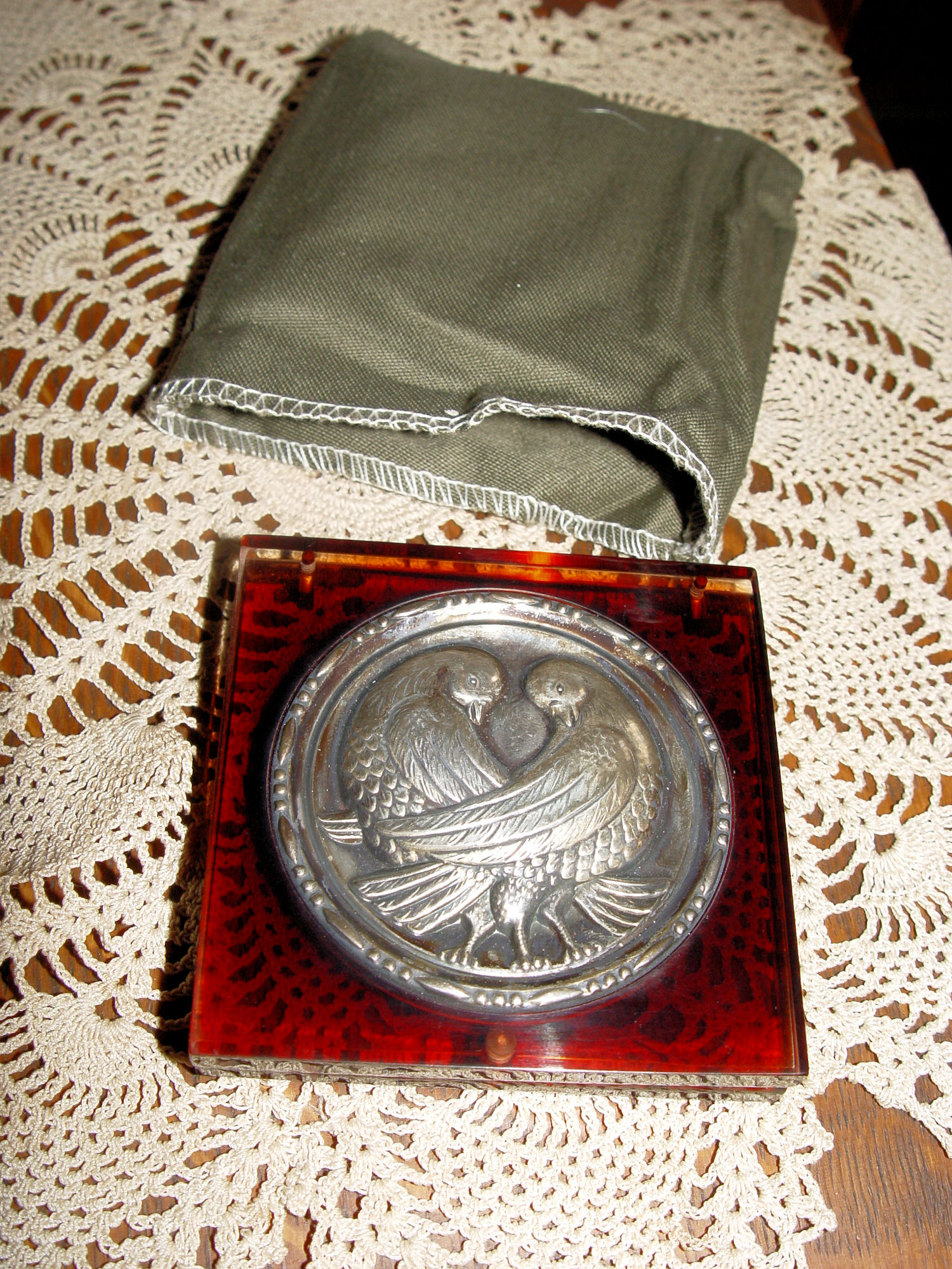 Silver & Burnt Amber
                                        Lucite Love Birds c. 1940s
                                        Powder Compact