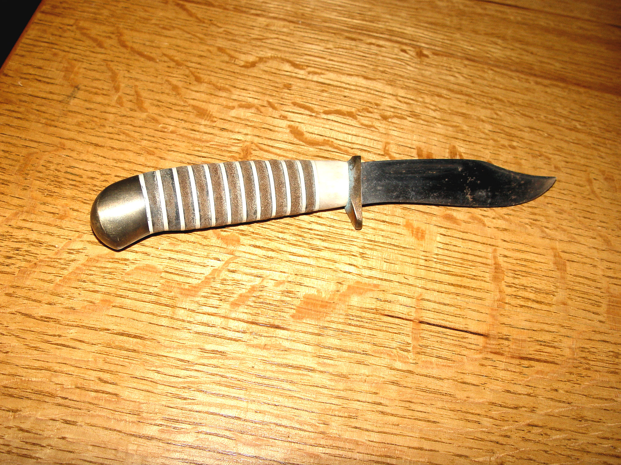 Early
                        7" Handmade Bone and Brass Native American
                        Fixed Blade Knife