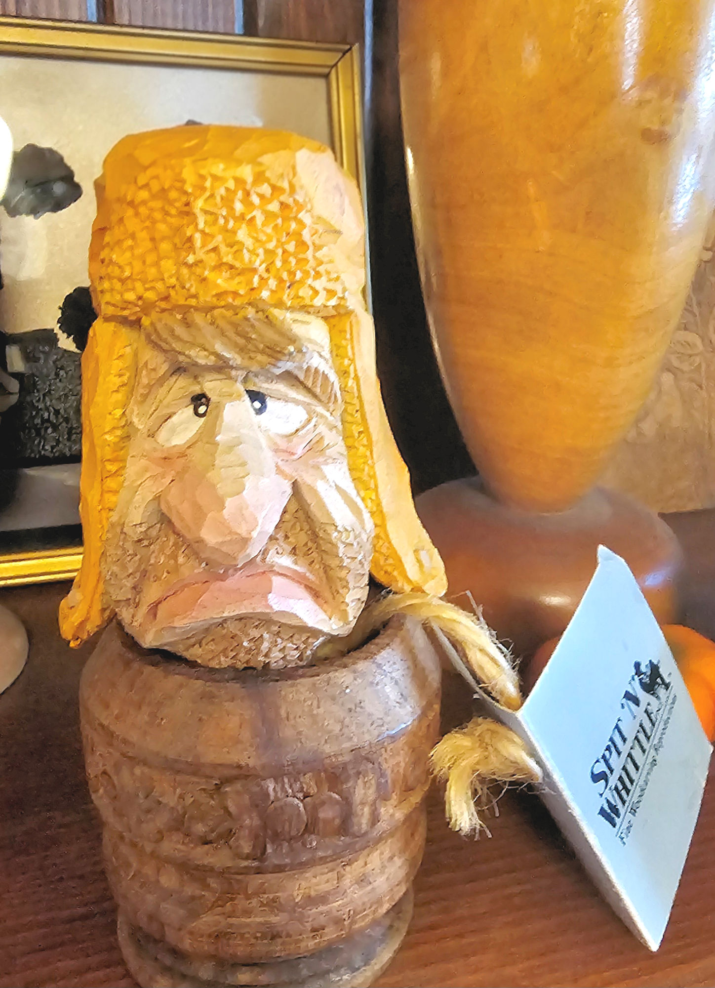 Spit ’N’
Whittle Hand‑Carved Wine Cork Wood Figure –
Rustic Barrel‑Head Character, Folk Art