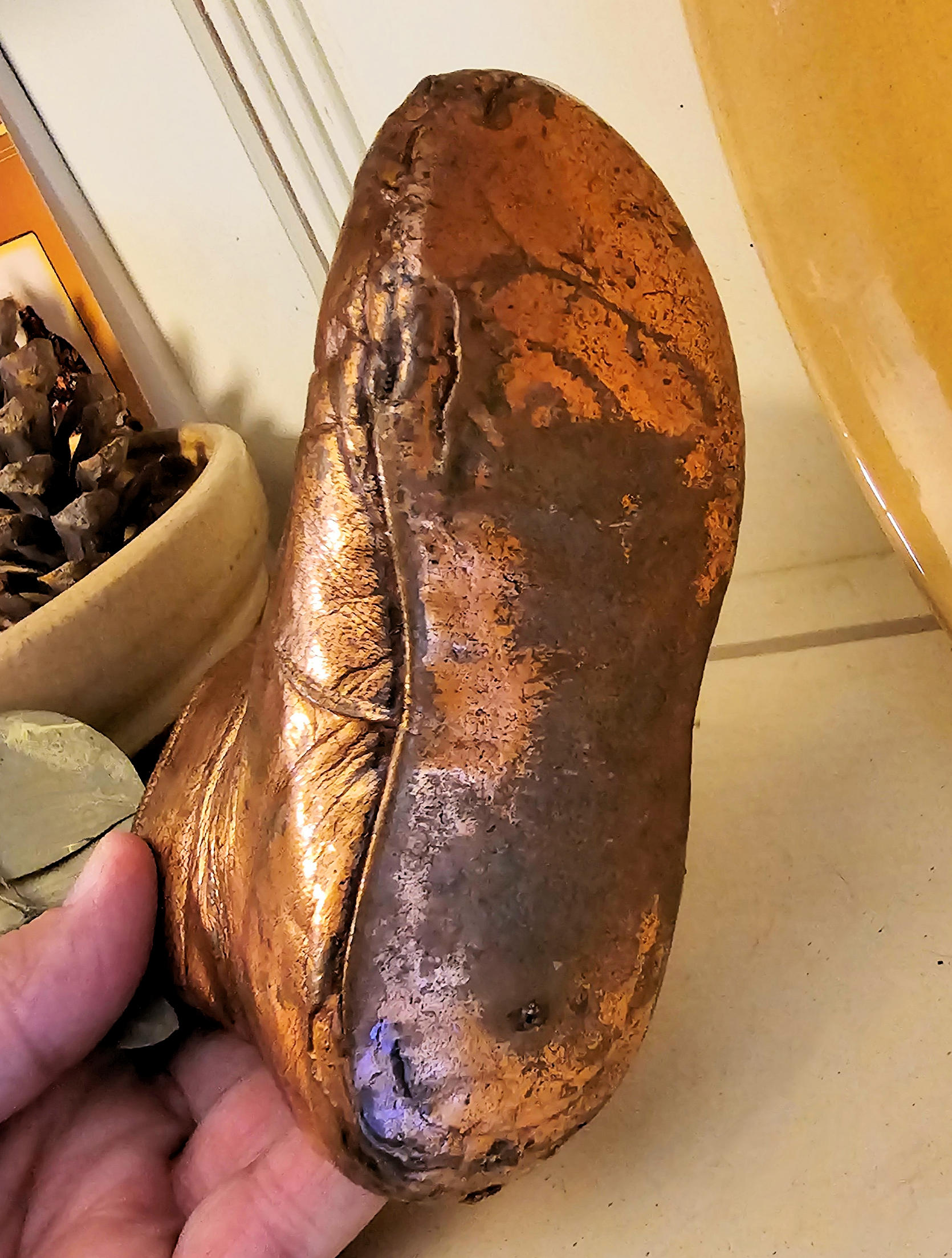 Antique bronzed copper coated Victorian button-up
baby shoe