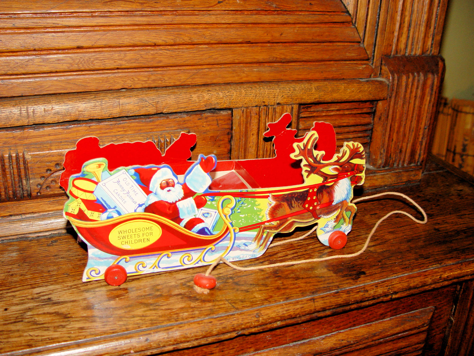 Fanny Farmer “Old Time Candies” Santa &
Reindeer sleigh and Orig. Box