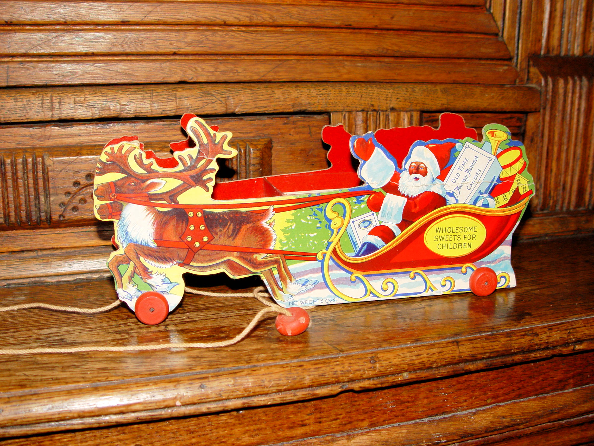 Fanny Farmer “Old Time Candies” Santa &
Reindeer sleigh and Orig. Box