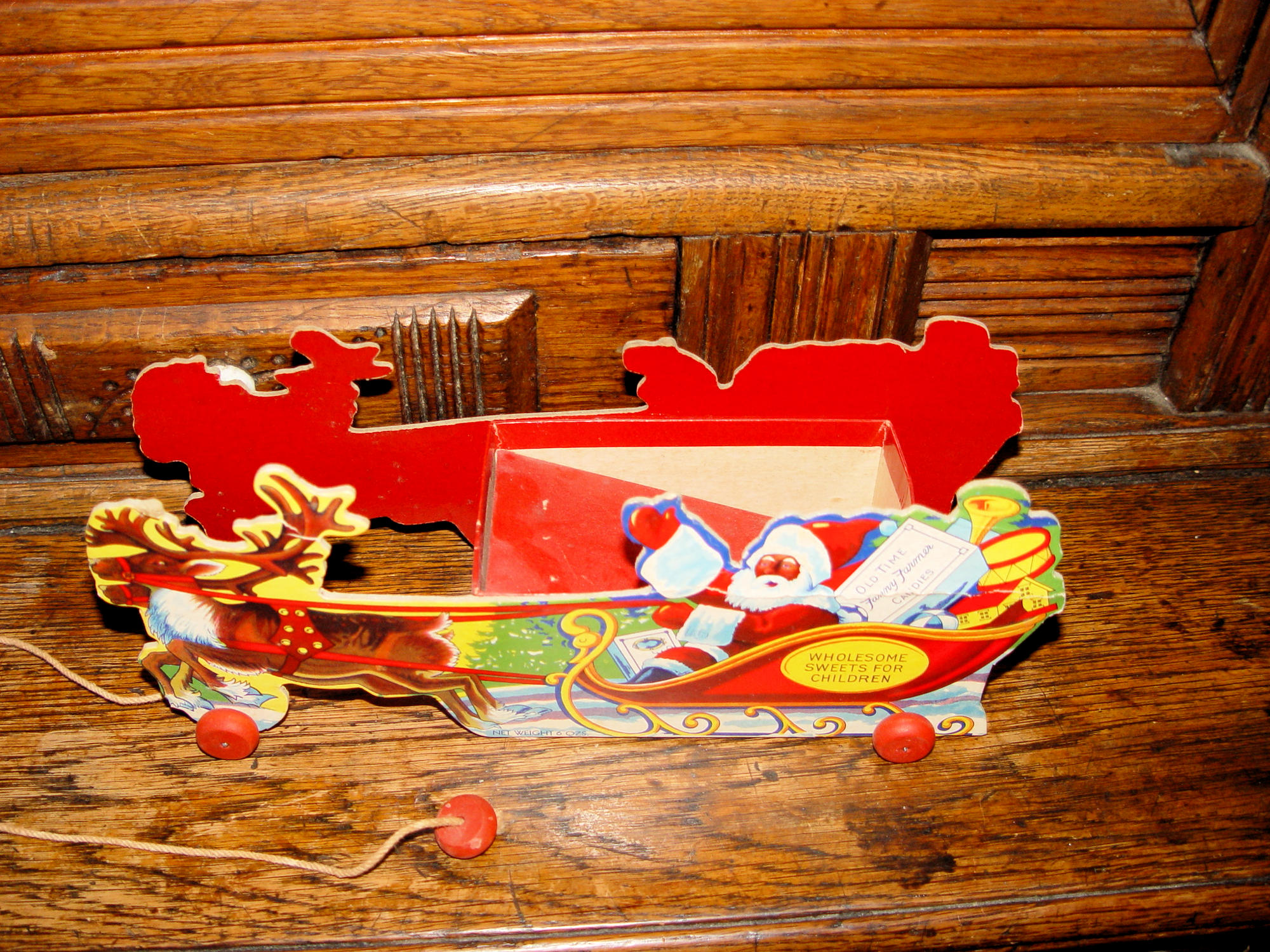Fanny Farmer “Old Time Candies” Santa &
Reindeer sleigh and Orig. Box