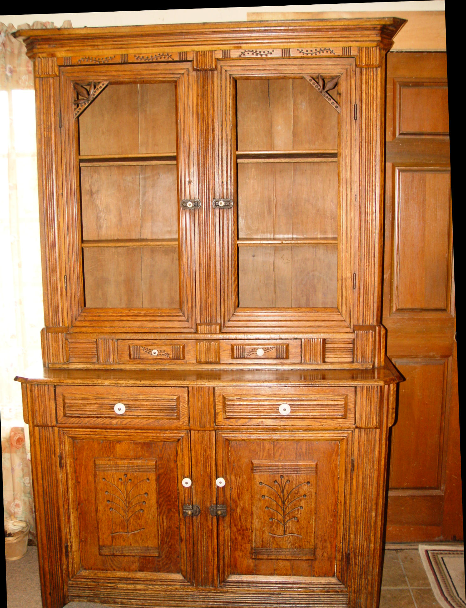 Hand‑Carved
                        Settler�s Cabinet with Tree of Life Motifs �
                        Bemidji, Minnesota Provenance